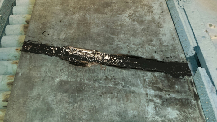 Conveyor belt repaired with rubber repair material, Belzona 2311 (SR Elastomer)